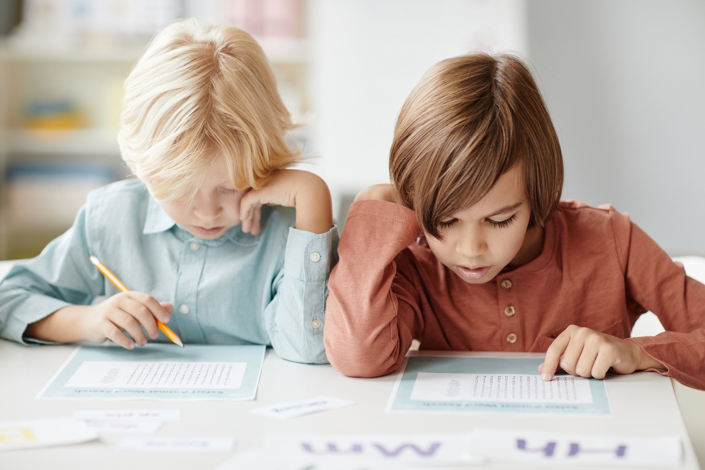 Children learning together at school